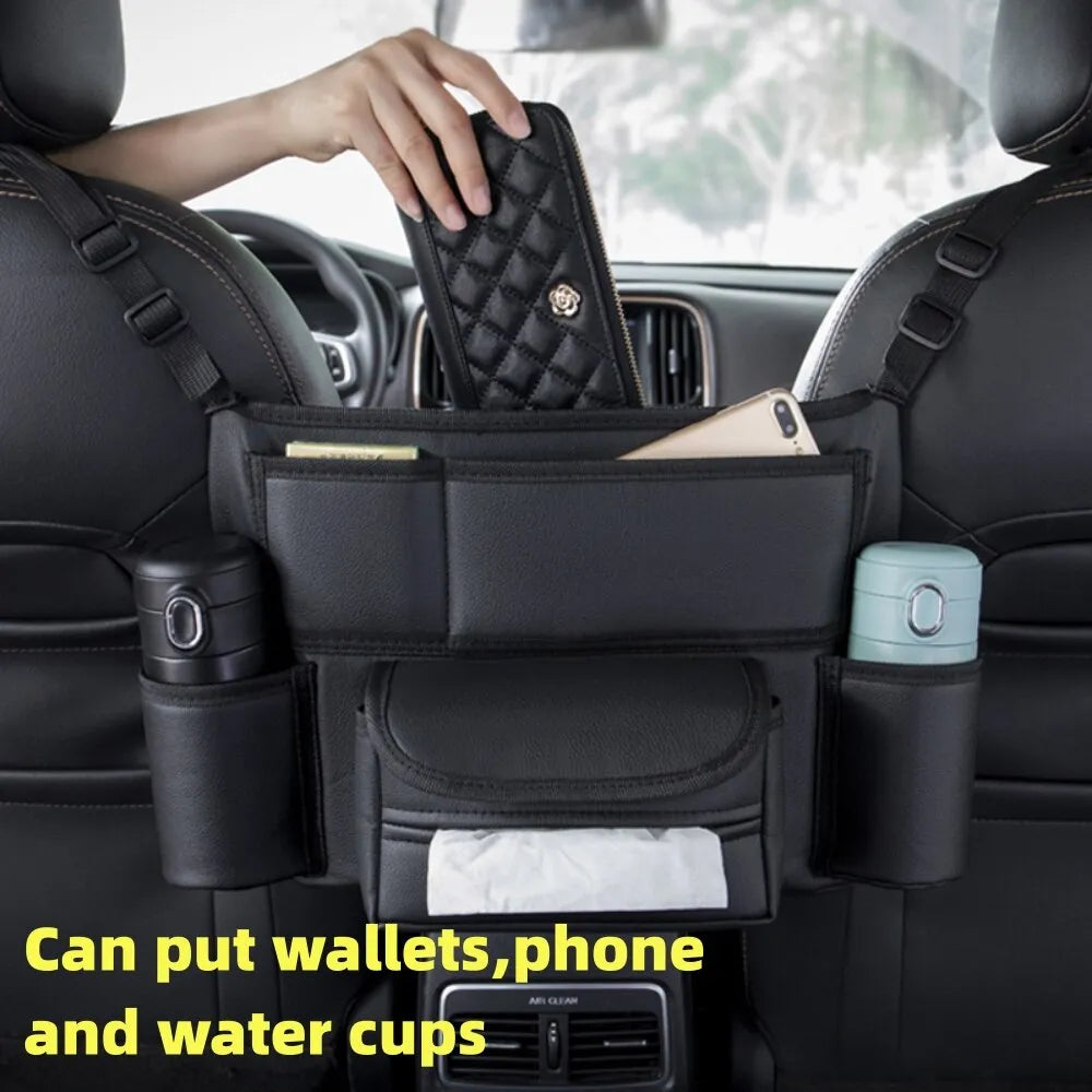 Car Seat Middle Hanger Storage Bag - Auto Handbag Holder Between Seats with Tissue and Water Cup Pockets - Interior Stowing and Tidying Solution - Delicate Leather