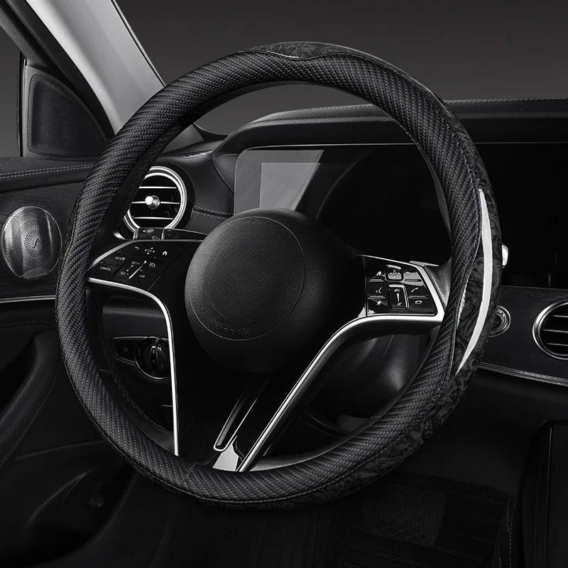 O/D Shape Carbon Fiber Leather Steering Wheel Cover – Universal 37–38cm, Anti-Slip Car Accessory - Delicate Leather  