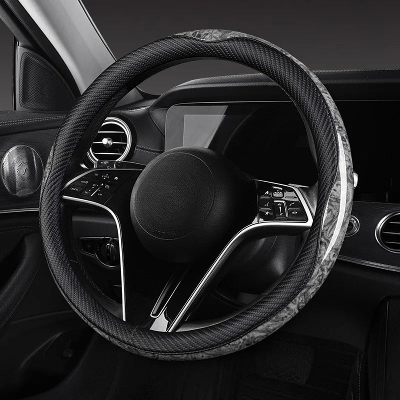 O/D Shape Carbon Fiber Leather Steering Wheel Cover – Universal 37–38cm, Anti-Slip Car Accessory - Delicate Leather  