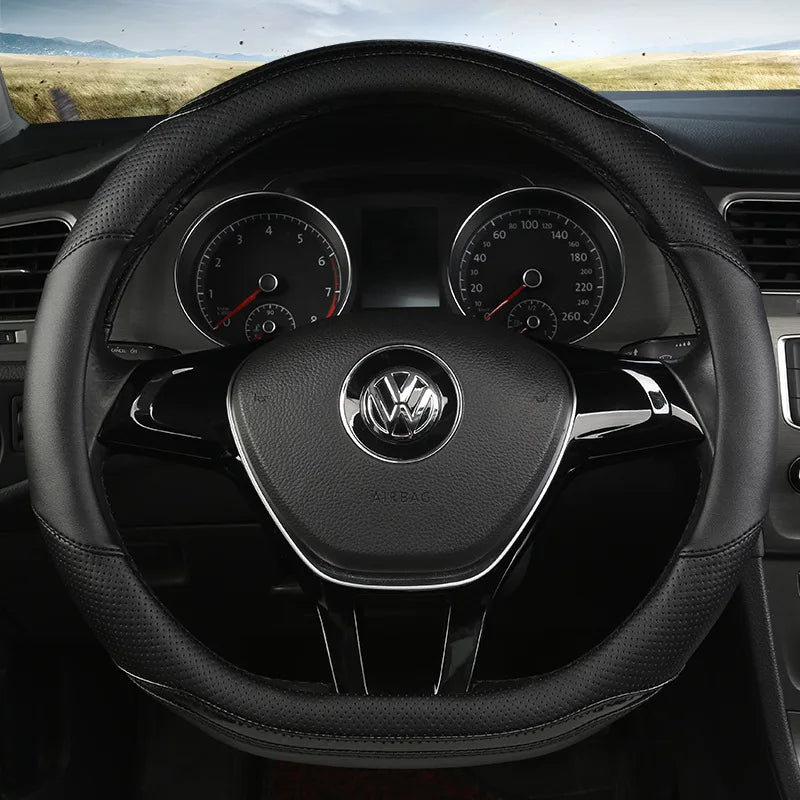 Four-Season Carbon Fiber Splicing Car Steering Wheel Cover – Universal Fit for 36–38/40 cm Wheels, Anti-Slip & Durable - Delicate Leather  