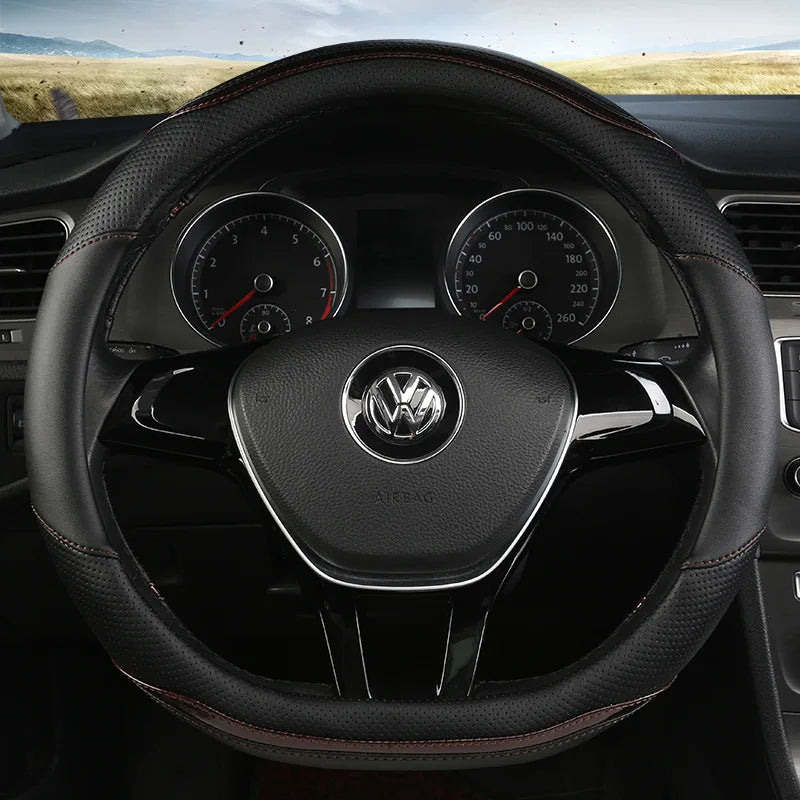 Four-Season Carbon Fiber Splicing Car Steering Wheel Cover – Universal Fit for 36–38/40 cm Wheels, Anti-Slip & Durable - Delicate Leather  